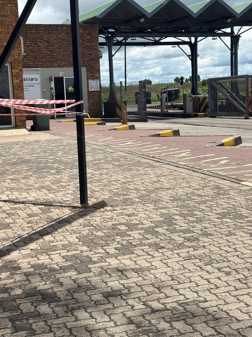 Paving, kerbing and road markings at a mine security checkpoint