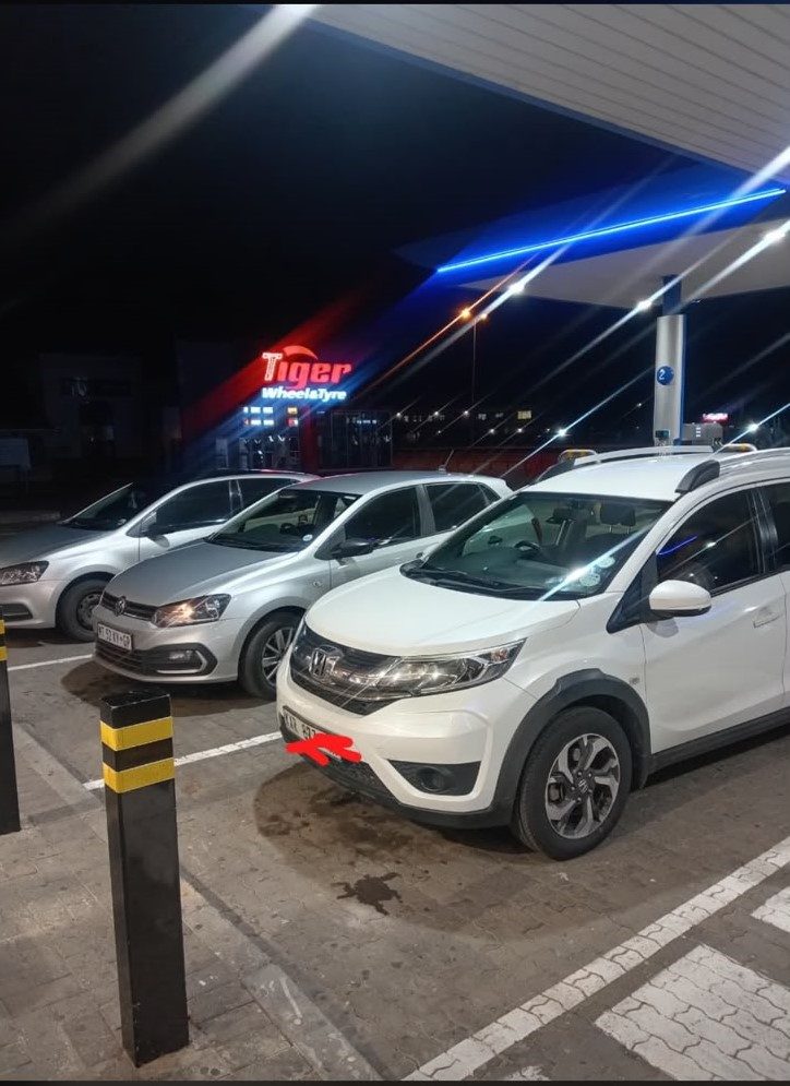 SVT Group shuttle vehicles refuelling at a service station at night